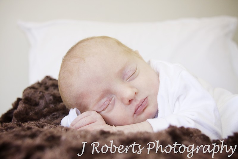 Baby sleeping on her hands - baby portrait photography sydney